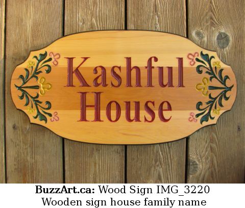 Wooden sign house family name